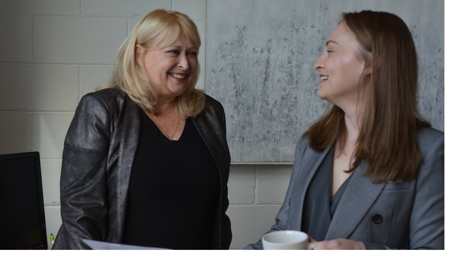 business people laughing together